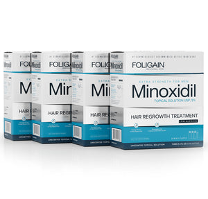 Kotak larutan sapuan minoksidil 5% FOLIGAIN untuk lelaki, formula rendah alkohol dalam pembungkusan biru dan putih.